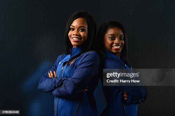 Gymnasts Gabby Douglas and Simone Biles pose for a portrait at the USOC Rio Olympics Shoot at Quixote Studios on November 20, 2015 in Los Angeles,...