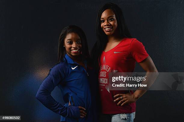 Gymnasts Simone Biles and Gabby Douglas pose for a portrait at the USOC Rio Olympics Shoot at Quixote Studios on November 20, 2015 in Los Angeles,...