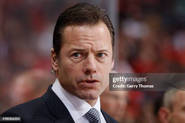 Assistant coach, Martin Gelinas, of the Calgary Flames looks on from the bench against the Chicago Blackhawks at Scotiabank Saddledome on November...