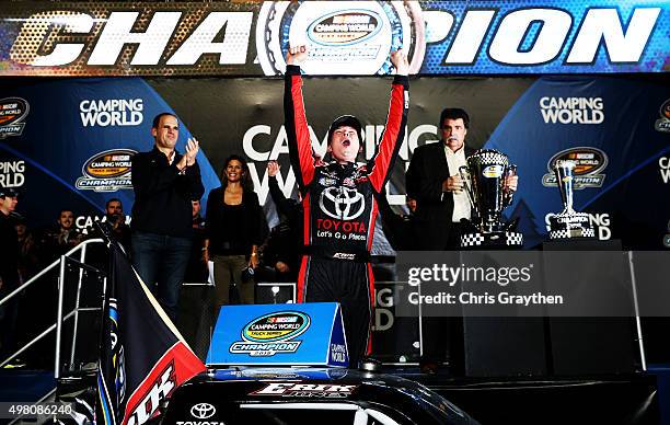Erik Jones, driver of the Toyota, celebrates winning the series championship after the NASCAR Camping World Truck Series Ford EcoBoost 200 at...