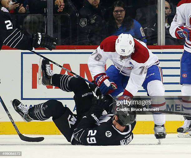 Subban of the Montreal Canadiens hits Brock Nelson of the New York Islanders following a collision with Carey Price at the Barclays Center on...