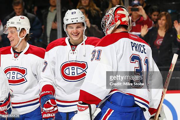Alex Galchenyuk and Carey Price celebrate the Montreal Canadiens' win against the New York Islanders at the Barclays Center on November 20, 2015 in...