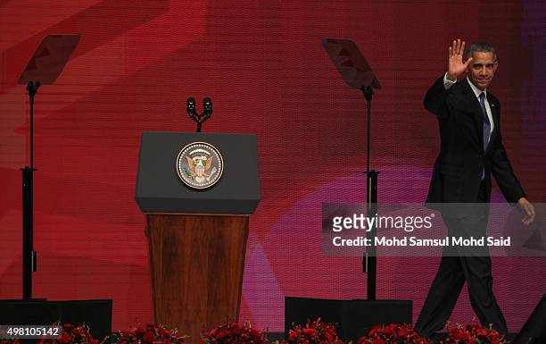 President Barack Obama leave the stage after gives a speech during The Asean Business and Investment Summit on November 21, 2015 in Kuala Lumpur,...