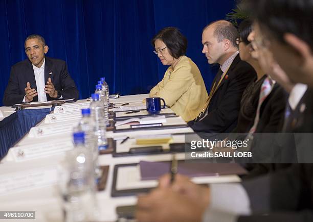 President Barack Obama speaks during a meeting with representatives from civil society organizations during a visit to Kuala Lumpur on November 21,...