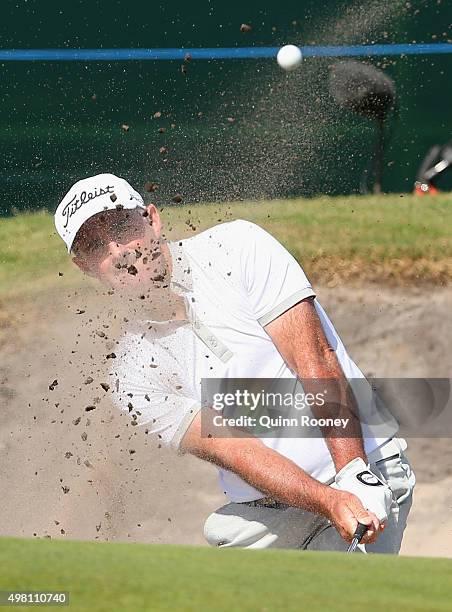 Matthew Millar of Australia plays out of the bunker during day three of the 2015 Australian Masters at Huntingdale Golf Club on November 21, 2015 in...