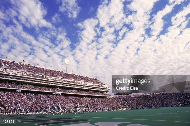 General view of the cloudly sky and the packed stadium taken during the game between the Kansas State Wildcats and the Baylor Bears at Wagner Field...