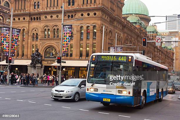 george street bus and qvb - sydney bus stock pictures, royalty-free photos & images