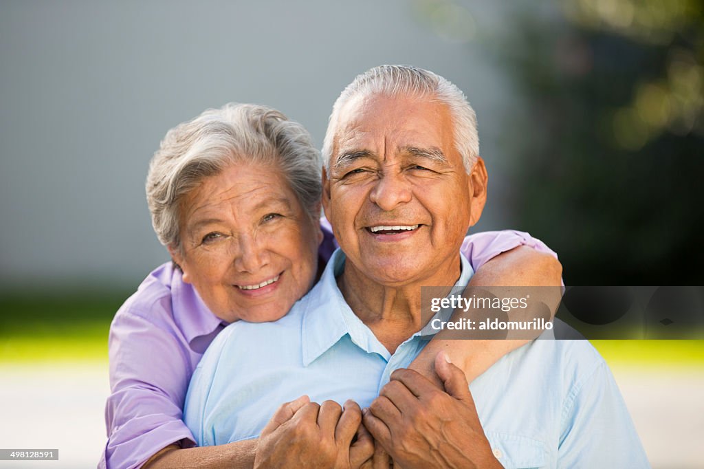 Loving senior couple hugging