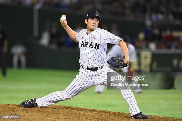 Tomoyuki Sugano of Japan pitches in the top half of fourth inning during the WBSC Premier 12 third place play off match between Japan and Mexico at...