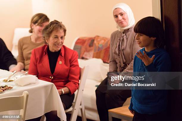 Syrian refugees and community leaders join together for a #RefugeesWelcome Thanksgiving dinner hosted by MoveOn.org on November 20, 2015 in Evanston,...