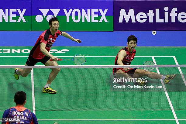 Yoo Yeon Seong and Lee Yong Dae of South Korea return a shot during the match between Lee Yong Dae and Yoo Yeon Seong of South Korea and Chai Biao...