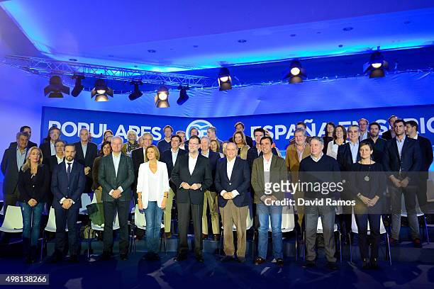 Spain's Prime Minister and President of Partido Popular Mariano Rajoy poses along with its candidates on November 21, 2015 in Barcelona, Spain....