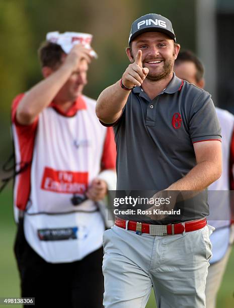 Andrew Sullivan of England acknowledges the crowd on the 18th green after making a par during the third round of the DP World Tour Championship on...