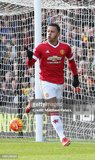Memphis Depay of Manchester United celebrates scoring their first goal during the Barclays Premier League match between Watford and Manchester United...