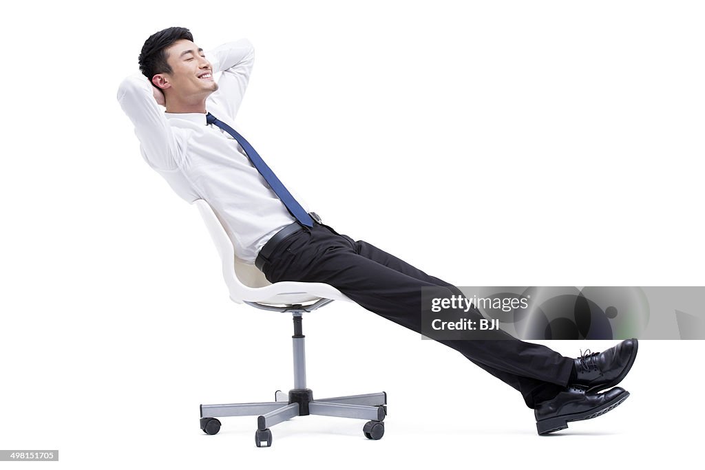 Resting In Chair Young Businessman Resting In Chair High-Res Stock Photo - Getty Images