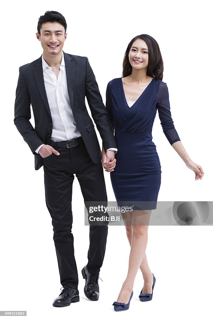 Young couple holding hands