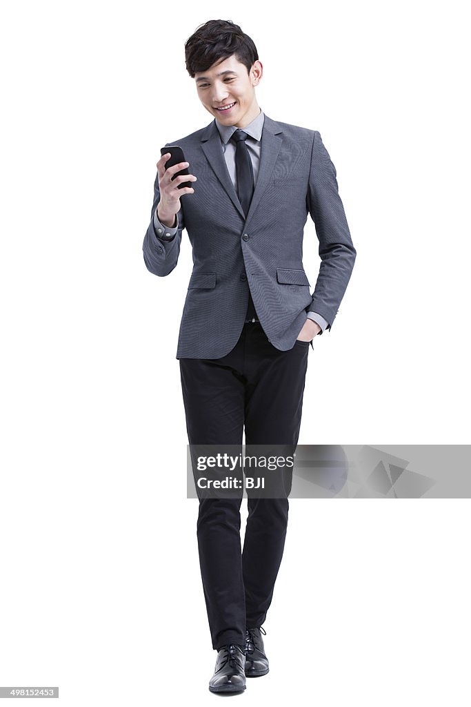 Young businessman with smart phone