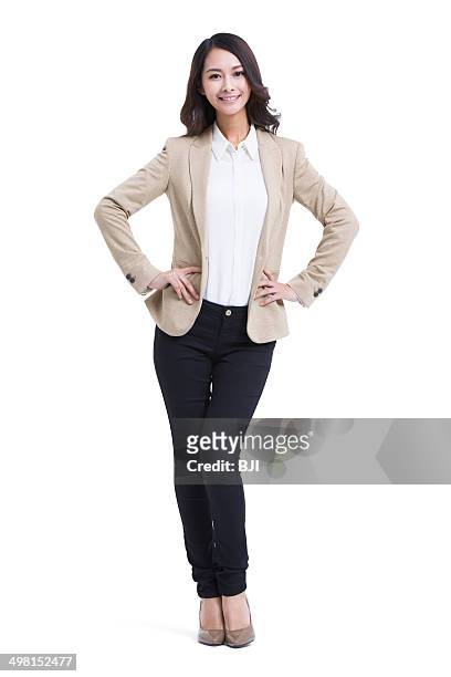 portrait of fashionable businesswoman - 両手を腰に当てる ストックフォトと画像