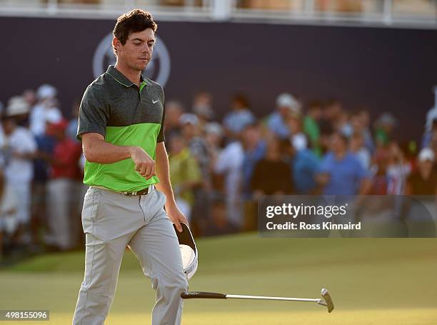 Rory McIlroy of Northern Ireland reacts to his par on his last hole, the par five 18th hole during the third round of the DP World Tour Championship...