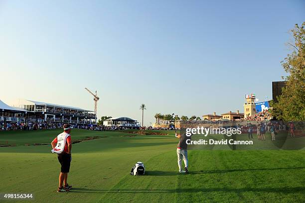 Andy Sullivan of England plays his third shot on the par 5, 18th hole during the third round of the 2015 DP World Tour Championship on the Earth...