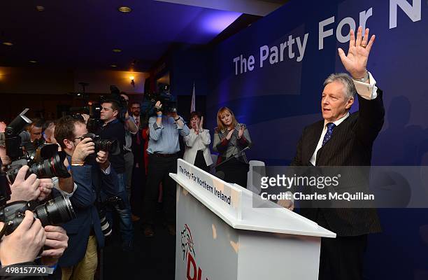 Peter Robinson waves goodbye to the party faithful after his final leaders speech during the Democratic Unionist Party annual conference at La Mon...
