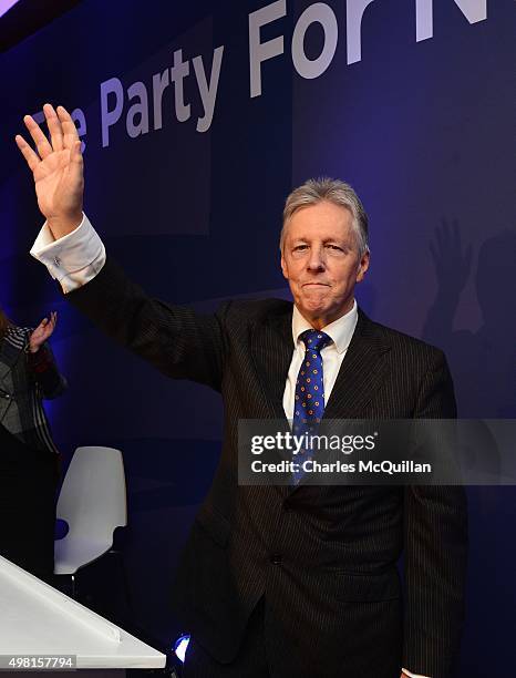 Peter Robinson waves goodbye to the party faithful after his final leaders speech during the Democratic Unionist Party annual conference at La Mon...