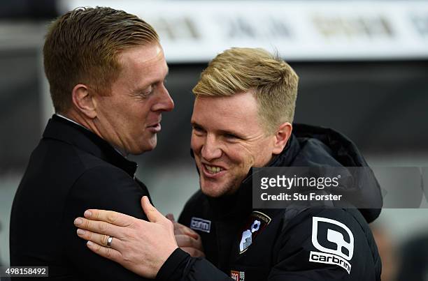 Bournemouth manager Eddie Howe and Garry Monk embrace before the Barclays Premier League match between Swansea City and A.F.C. Bournemouth at Liberty...