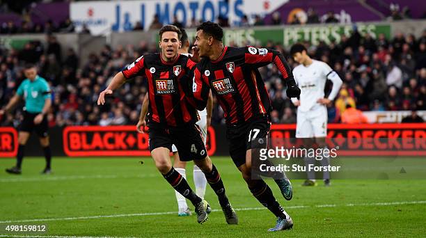 Bournemouth player Joshua King and Dan Gosling celebrate the opening goal during the Barclays Premier League match between Swansea City and A.F.C....