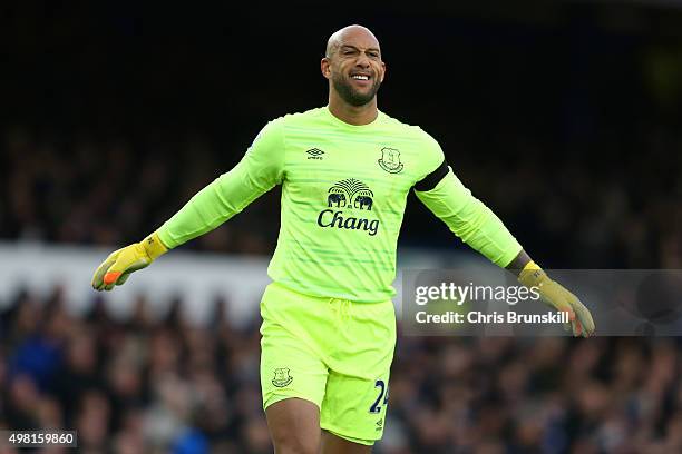 Tim Howard of Everton celebrate his team's first goal during the Barclays Premier League match between Everton and Aston Villa at Goodison Park on...