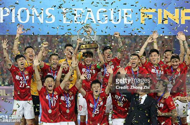 Players of Guangzhou Evergrande celebrate with trophy after winning the Asian Champions League Final 2nd leg Match between Guangzhou Evergrande and...