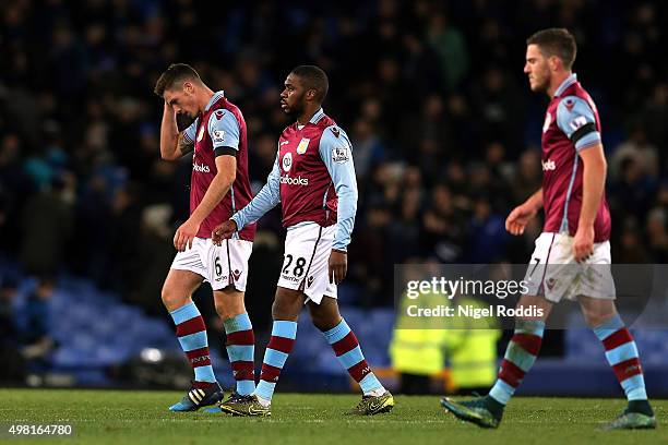 Ciaran Clark, Charles N'Zogbia and Jordan Veretout of Aston Villa leave the pitch after his team's 0-4 defeat in the Barclays Premier League match...