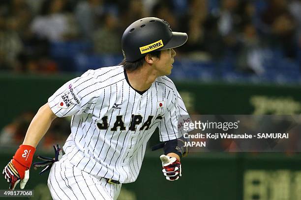 Tetsuto Yamada of Japan hits a two-run home-run in the bottom half of the second inning the WBSC Premier 12 third place play off match between Japan...