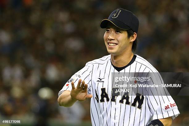 Tetsuto Yamada of Japan looks on the WBSC Premier 12 third place play off match between Japan and Mexico at the Tokyo Dome on November 21, 2015 in...