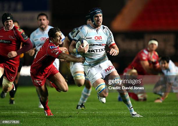 Bernard Le Roux of Racing 92 evades Aled Thomas of Scarlets during the European Rugby Champions Cup match between Scarlets and Racing 92 at the Parc...