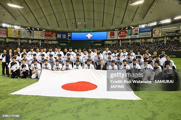 Japan team pose for a team photo after winning the WBSC Premier 12 third place play off match between Japan and Mexico at the Tokyo Dome on November...