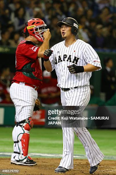 Sho Nakata of Japan celebrates as he scores after hitting a two-run home-run the WBSC Premier 12 third place play off match between Japan and Mexico...