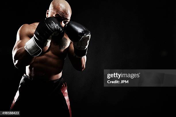 boxer punching - boxer stock-fotos und bilder