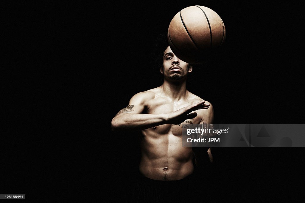 Basketball player throwing basketball