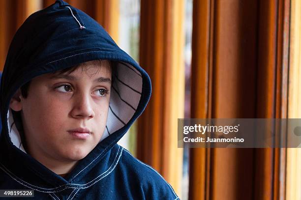 sad child - orphan boy stock pictures, royalty-free photos & images