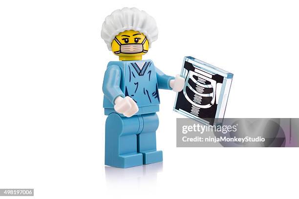 surgeon with xray lego mini-figure - plastic block stock pictures, royalty-free photos & images