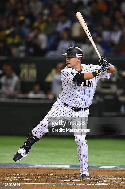 Yoshitomo Tsutsugo of Japan bats in the bottom half of the sixth inning during the WBSC Premier 12 third place play off match between Japan and...