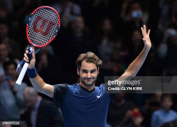 Switzerland's Roger Federer celebrates after beating Switzerland's Stan Wawrinka in a men's singles semi-final match on day seven of the ATP World...