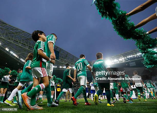 Players of Palmeiras enter the field before the match between Palmeiras and Cruzeiro for the Brazilian Series A 2015 at Allianz Parque stadium on...