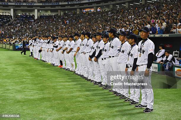 The Japan team line up after winning the WBSC Premier 12 third place play off match between Japan and Mexico at the Tokyo Dome on November 21, 2015...