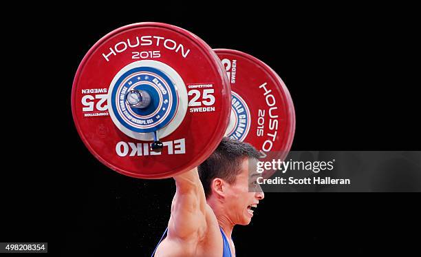 Jingbiao Wu of China competes in the men's 56kg weight class during the 2015 International Weightlifting Federation World Championships at the George...