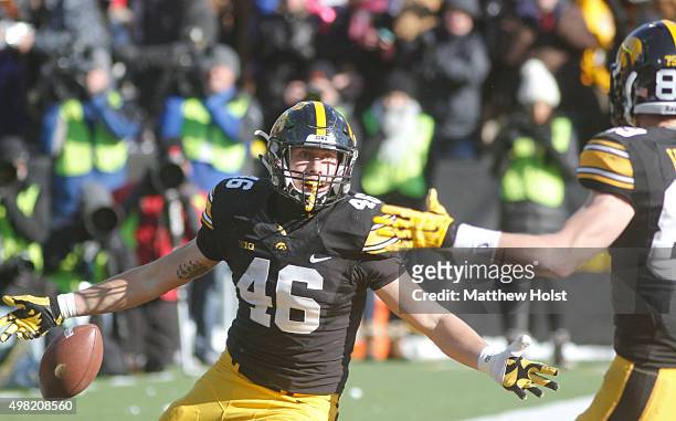 Tight end George Kittle celebrates with wide receiver Matt VandeBerg of the Iowa Hawkeyes after a touchdown in the second half against the Purdue...