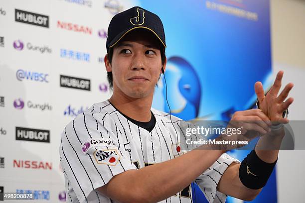 Tetsuto Yamada of Japan speaks to the press after winning the WBSC Premier 12 third place play off match between Japan and Mexico at the Tokyo Dome...