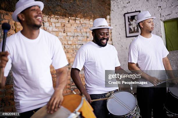 feeling the rhythm in their drums - capital cities band stock pictures, royalty-free photos & images