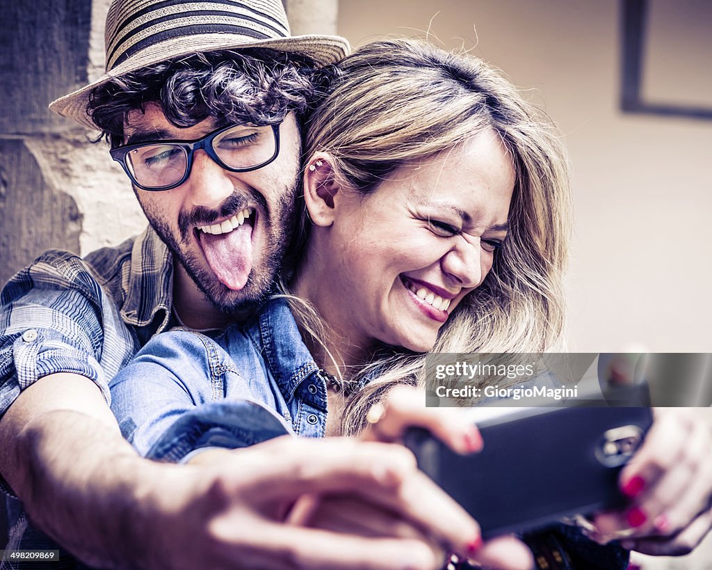 Funny Selfie, Couple of Hipsters Having Fun with Smartphone Photography