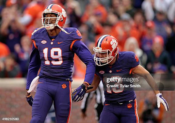 Charone Peake of the Clemson Tigers celebrates with Hunter Renfrow after a touchdown during their game against the Wake Forest Demon Deacons at...